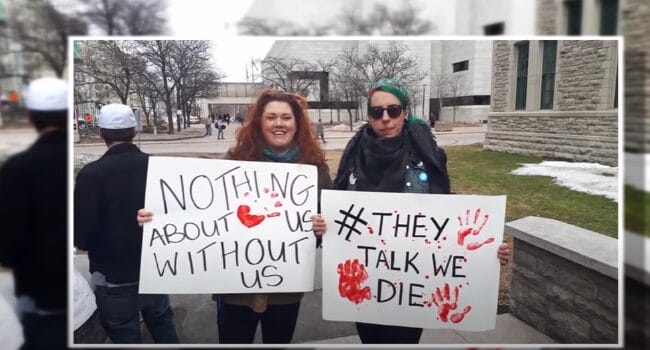 Two women protesting in Flood: The Overdose Epidemic in Canada